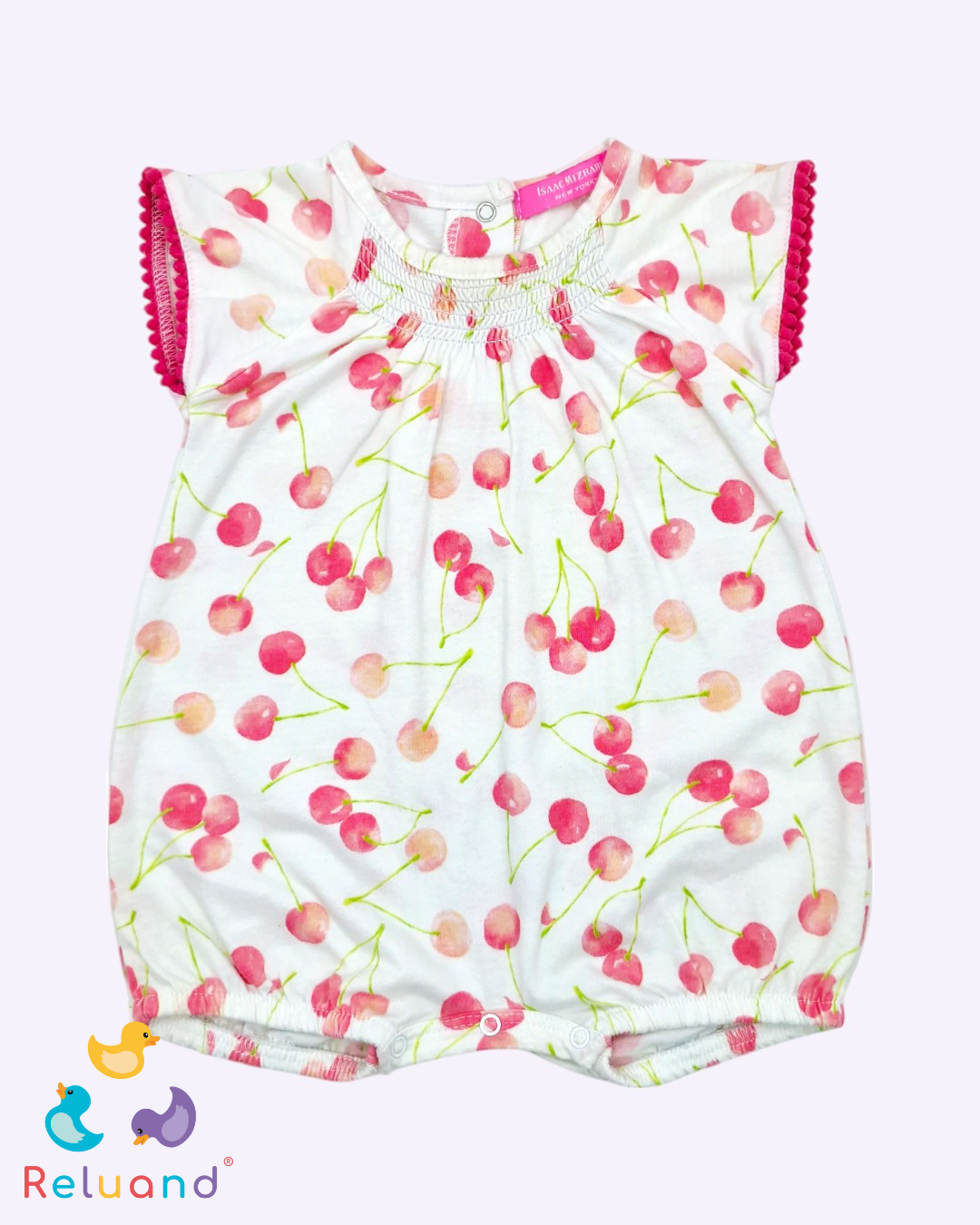 Jumper blanco con cerezas y detalles en las mangas con bolitas rosadas de lana, Marca Isaac Mizrahi, Talla 0 a 3 meses.