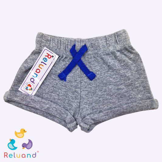 Set shorts X3: gris, negro a rayas con pin de tractor, color piel a rayas azul, Marca Carter´s, Talla NB.