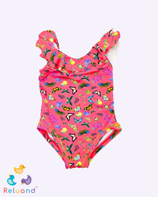 Vestido de baño enterizo en color salmón con mariposas, marca Offcorss y talla 24 meses.