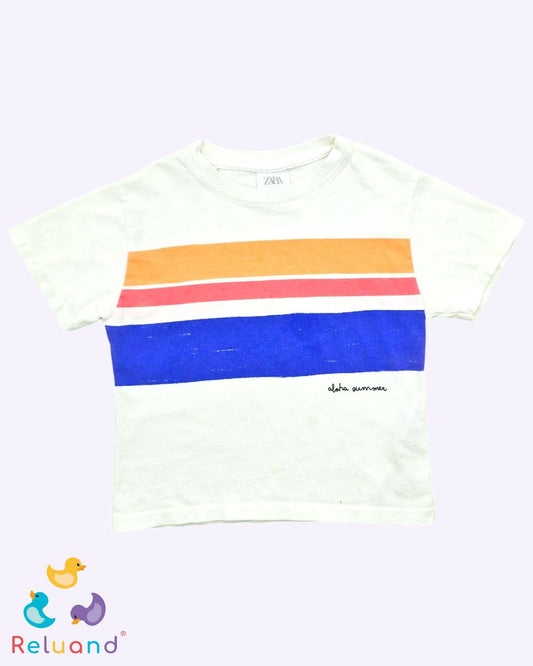 Camiseta blanca con segmentos azul, rojo y naranja de la marca Zara, talla 12 a 18 meses.
