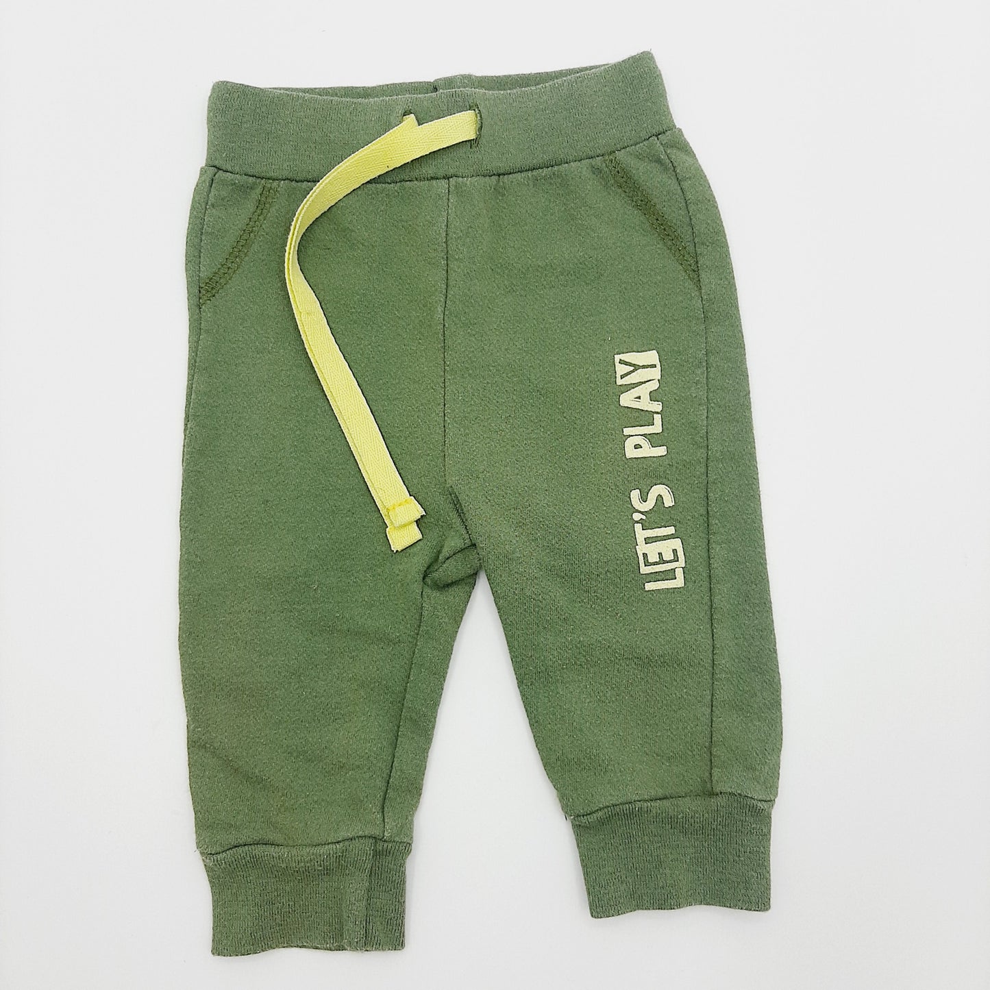 Pantalon verde de letras 3-6M marca Tomaticos