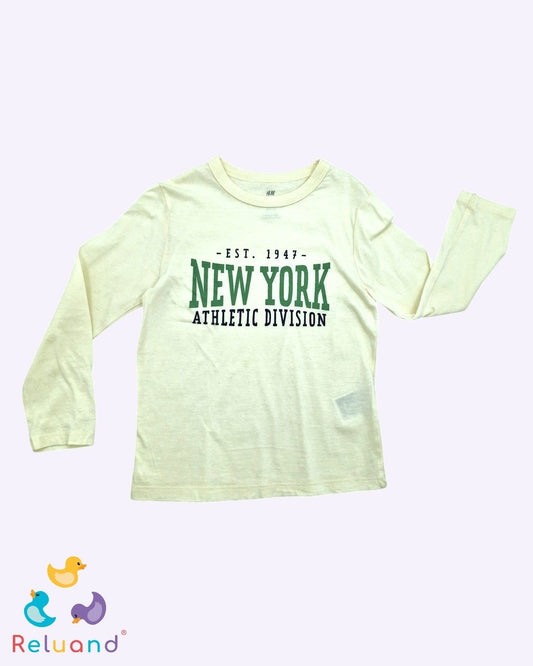 Buso color crema de la marca H&M, talla 4T.