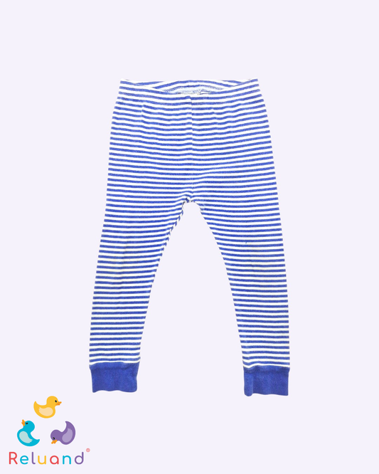 Pantalón en licra rayas en color azul oscuro y celeste, marca Carter´s, talla 24 meses.