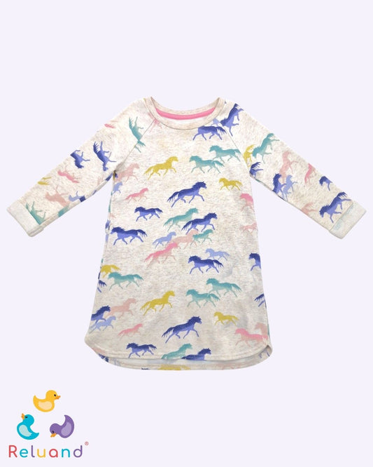 Vestido en color crema con caballos de colores pastel, marca H&M, talla 2T.