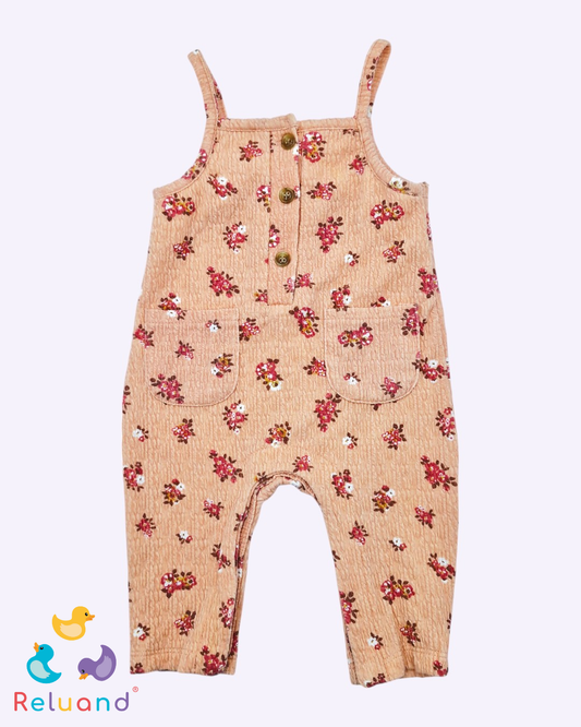 Jumper color salmón con flores en rojo y blando, estilo a tiras con botones beige, Marca Nicole Miller New York, Talla 3 a 6 meses.