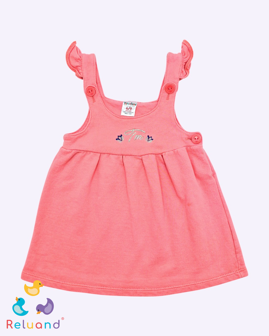 Jardinera color salmón con boleros en los tirantes y bordado en plateado, Marca Tomaticos, Talla 6 a 9 meses.