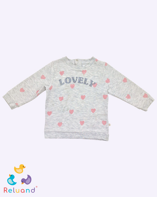 Saco gris con corazones rosados y lovely en purpurina planeada, Marca Bb Cheeky, Talla 6 a 12 meses.