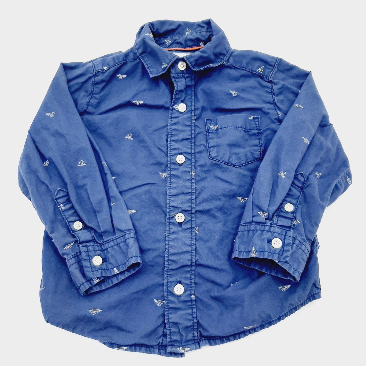 Camisa azul de aviones 24M marca Carter´s