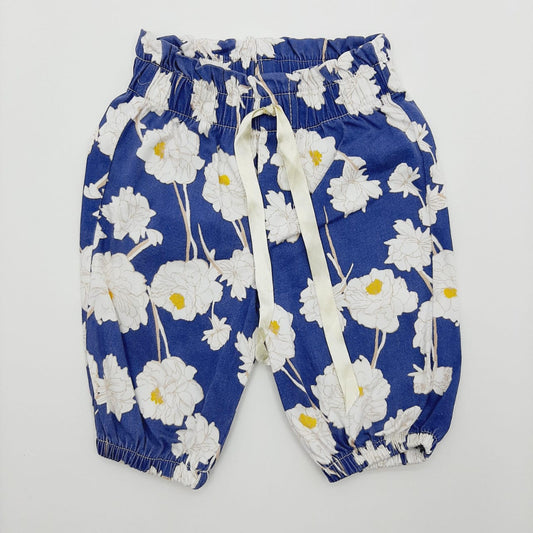 Pantalon azul flores blancas