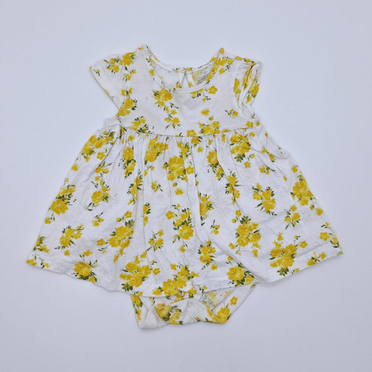 Vestido blanco con flores amarillas marca bundles 9-12 meses