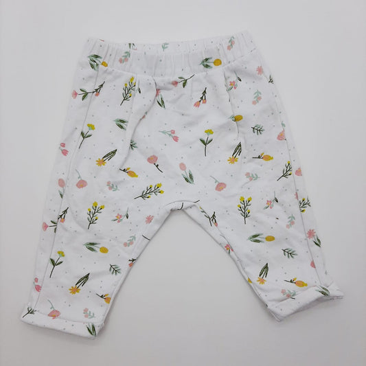 Pantalon blanco de flores 6-9M marca Offcorss