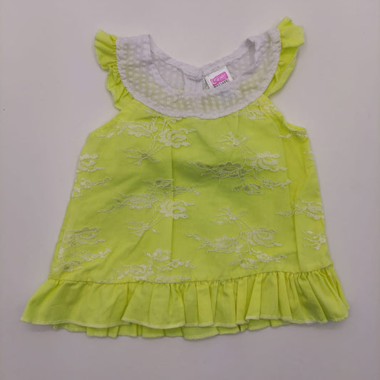 Blusa amarilla de encaje 12M