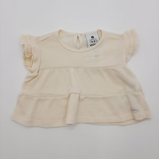 Blusa color cremita 6-9M marca Offcorss