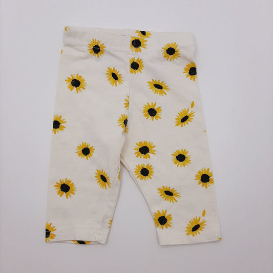 Pantalon de girasoles 6-9M marca Primark