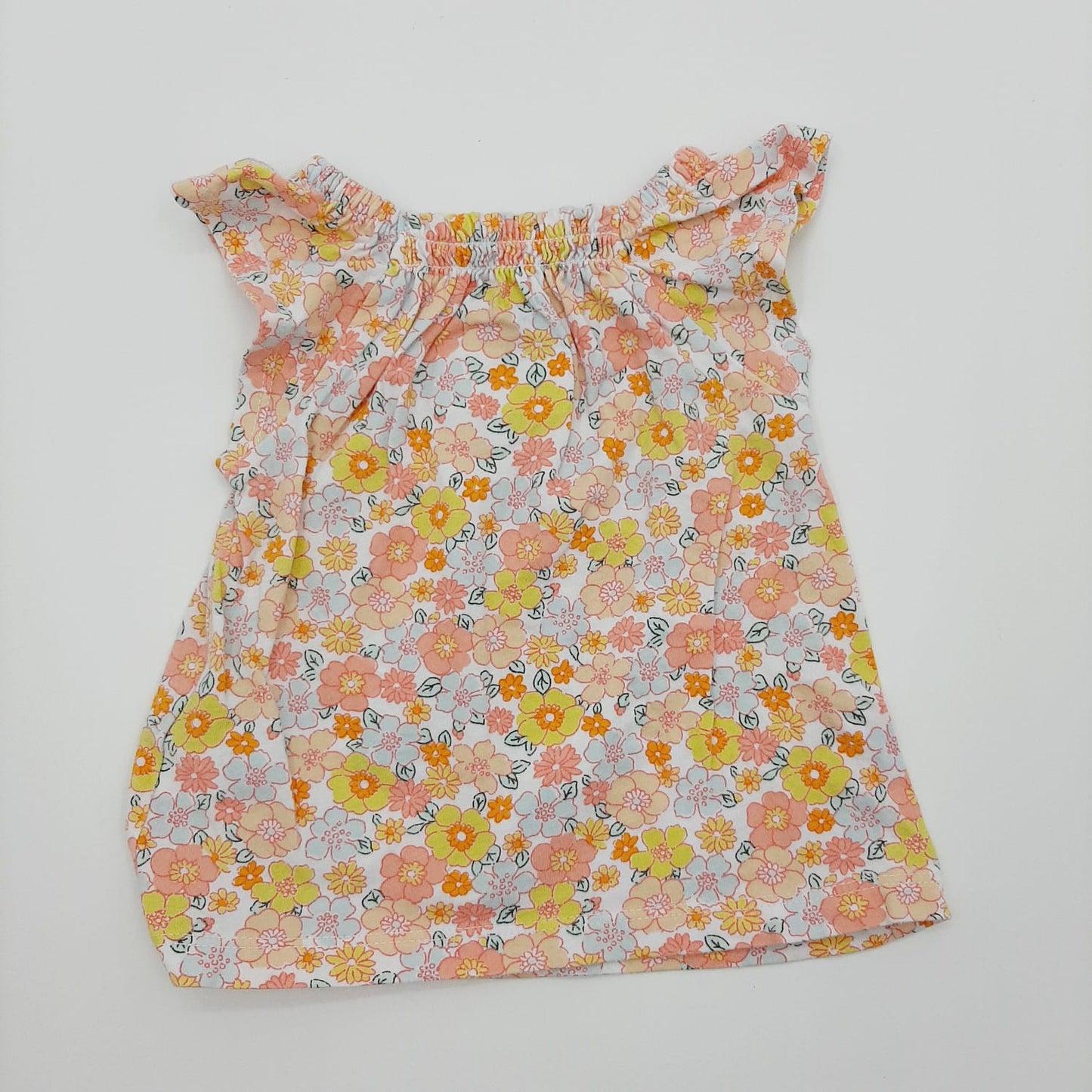 Blusa de flores naranjas 12M marca Carter´s