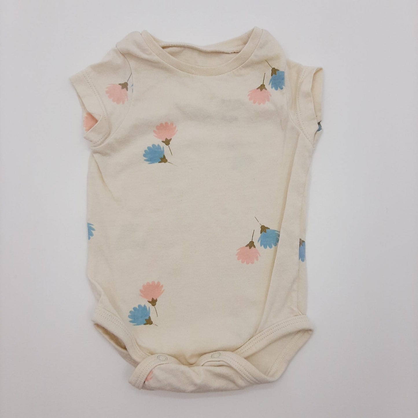 Body beige de flores 0-3M marca Baby Fresh