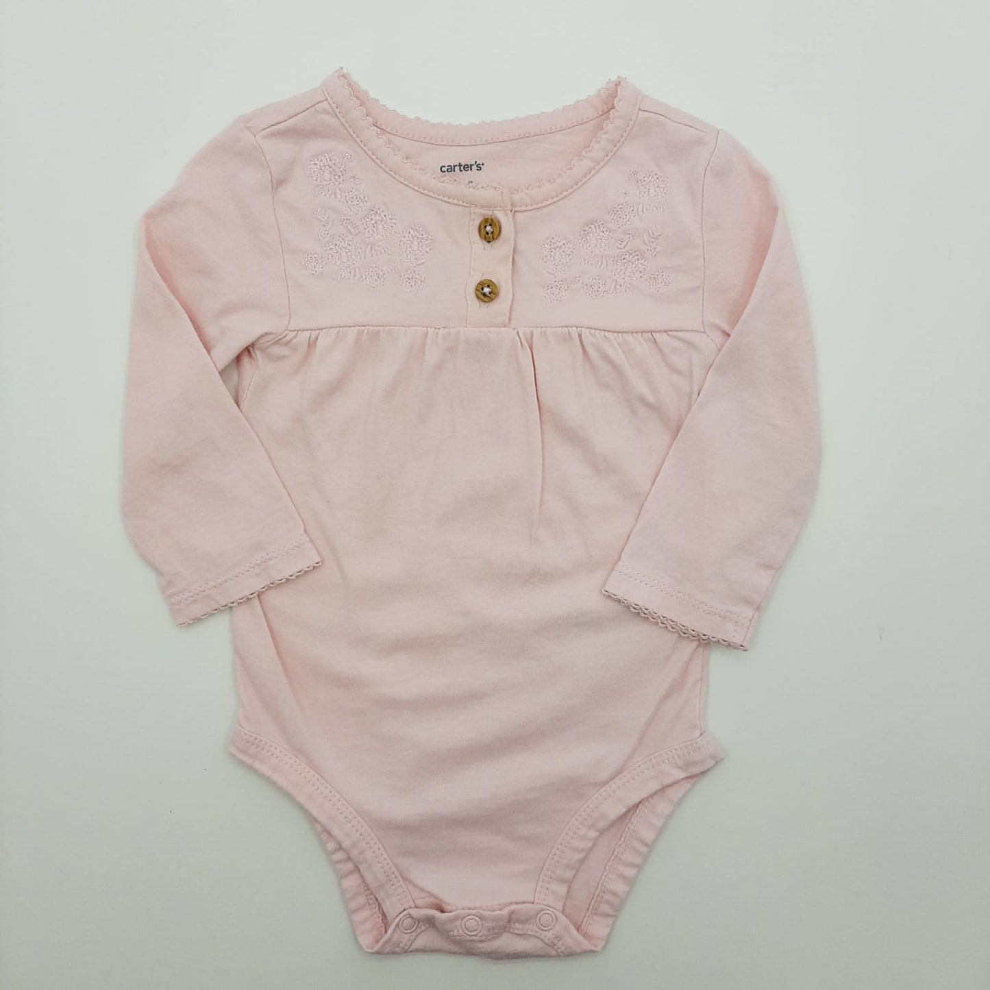 Body Rosado Manga Larga 9M marca Carters