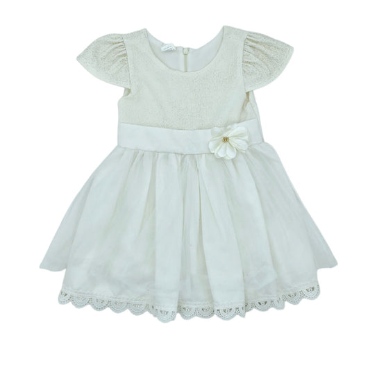 Vestido beige  con flor — Talla 24 a 36 meses | Usado
